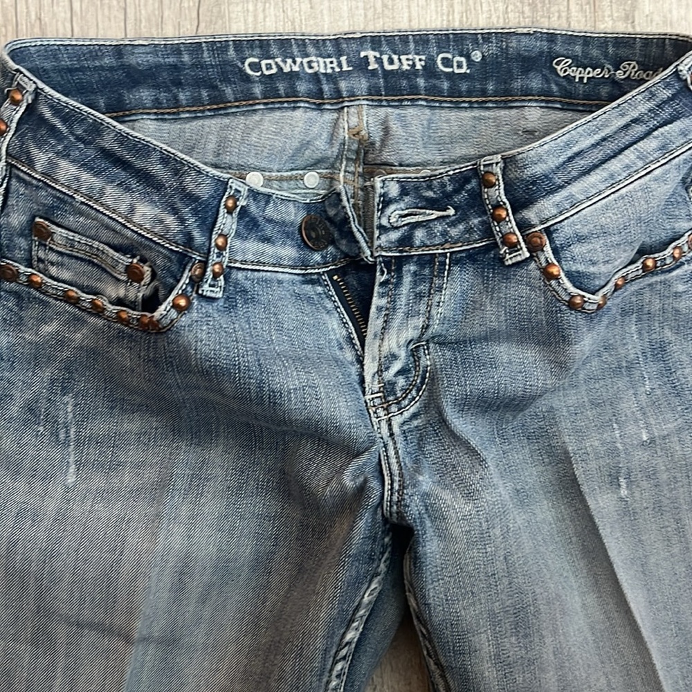 Cowgirl Tuff Women's Light Blue Boot Cut Jeans with Copper Studs